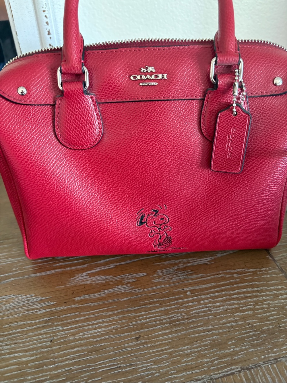 COACH Red Pebble Leather Satchel with Snoopy Accent